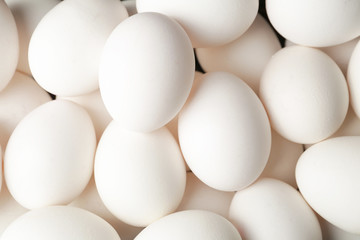 Fresh raw eggs as background