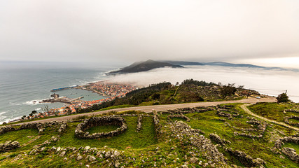 coastal city with fog