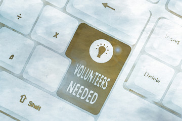 Conceptual hand writing showing Volunteers Needed. Concept meaning need work or help for...