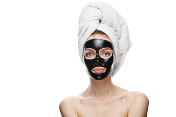 girl with black cosmetic mask on face