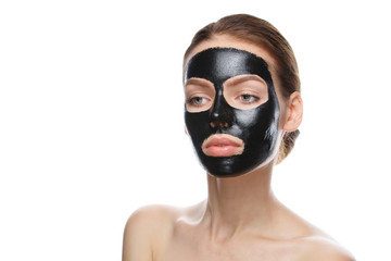 girl with black cosmetic mask on face