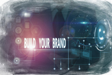 Writing note showing Build Your Brand. Business concept for enhancing brand equity using advertising campaigns Picture photo network scheme with modern smart device