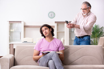 Obraz premium Young student and his father