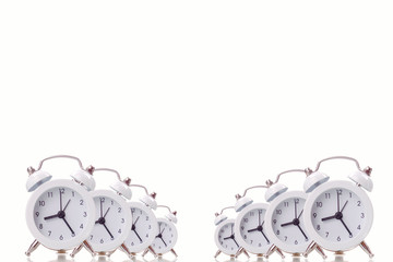 White alarm clock on white background