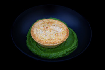 Beef pie with mushy peas