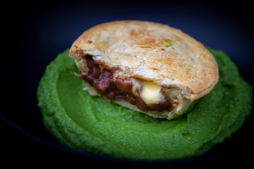Beef pie with mushy peas