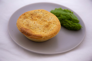 Beef pie with mushy peas