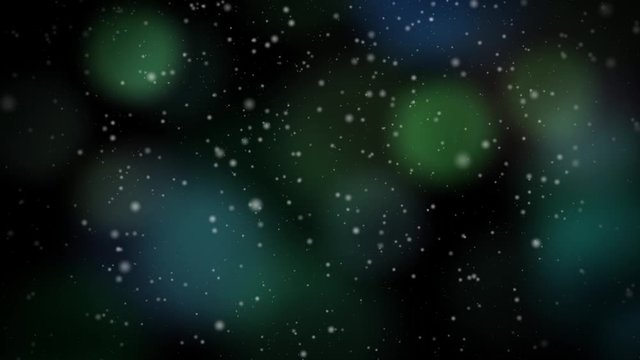 Abstract Seamlessly Looping Video features snow falling backed by colorful blue and green blinking Christmas lights in the soft-focus background.