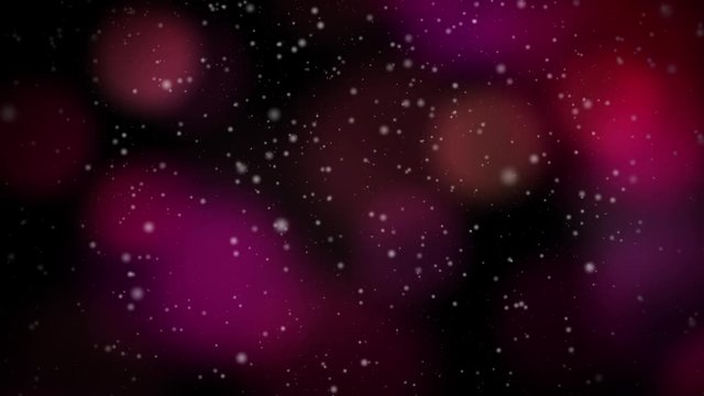 Abstract Seamlessly Looping Video features snow falling backed by colorful blinking Christmas lights of pink, red, and maroon in the soft-focus background.