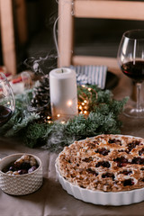 Christmas Thanksgiving table setting. Festive decoration. Celebration night. Festive dinner among family. Turkey day. Cranberry sauce. Apple pie. Delicious food, family and friends dinner night.