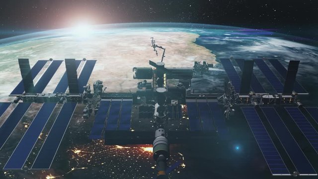 Close up of ISS orbiting realistic planet Earth. International Space Station revolving over ocean and mainland. Exploration mission. 3d render animation. 4K. Elements of this media furnished by NASA