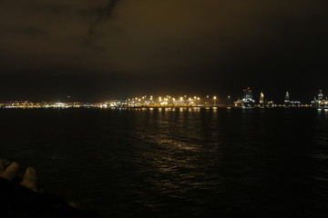 Boat and harbor in to night