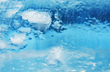 Ice background. The frozen texture of the water