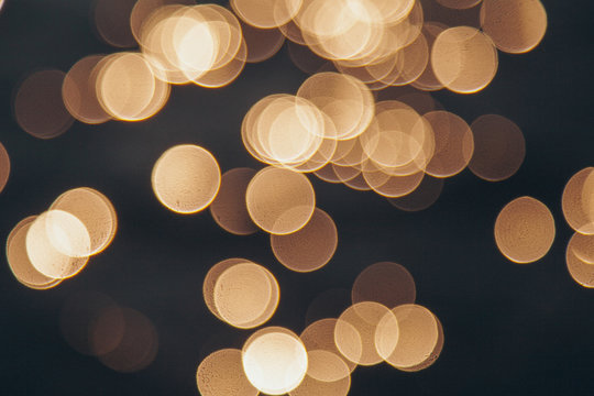 the concept of boating, relaxing at sea - splashes of blue water in the sea close-up. Colorful Bright Stage Lights in a Concert the blurred blue and white light spotlights. boce as background