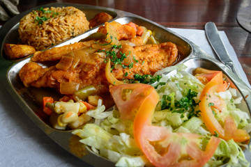 Caribeean fried fish with rice