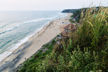 Bird Eyes view from Varkalas beach behind grass along the cliff, India