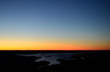 Fototapeta na wymiar Colorful sunset over lake