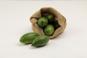 Parval or Pointed gourd in a wooden contianer.