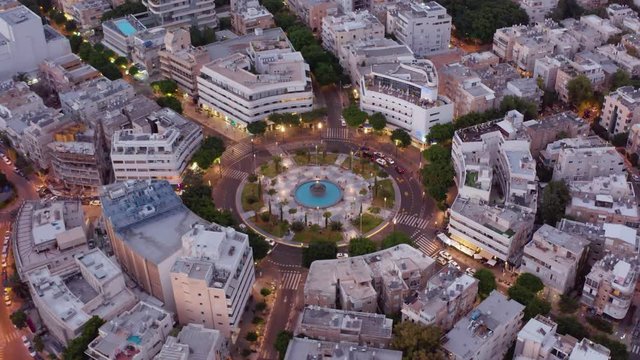 Dizengoff square in tel Aviv, Israel, at night, 4k aerial drone view