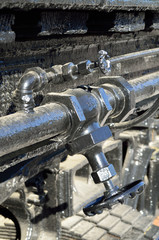 Fototapeta premium Pipes and valves on train engine