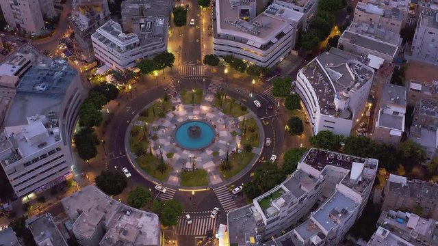 Dizengoff square in tel Aviv, Israel, at night, 4k aerial drone view