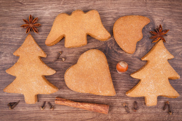 Gingerbreads with ingredients for baking, christmas time concept