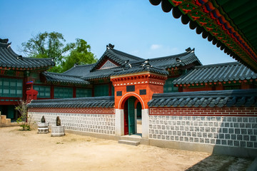 Naklejka premium Side gate in Jagyeongjeon Hall, residing area of Queen Sinjeong in Gyeongbokgung Palace, Joseon dynasty, Seoul, South Korea.