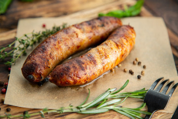 grilled sausages on grill