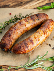 grilled sausages with potatoes and rosemary