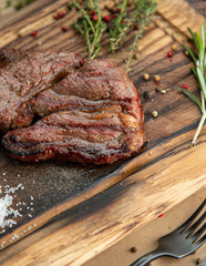 grilled steak with vegetables on plate