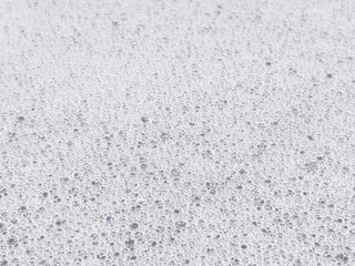 White soapsuds texture, soap foam background, close up view