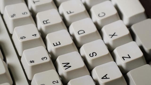 Finger presses nomber 3 or # button on keyboard