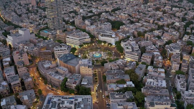 Dizengoff square in tel Aviv, Israel, at night, 4k aerial drone view