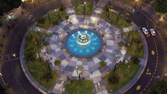 Dizengoff square in tel Aviv, Israel, at night, 4k aerial drone view