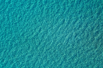 Blue ocean background from above 