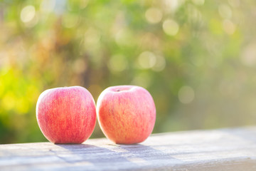 apples on wooden table