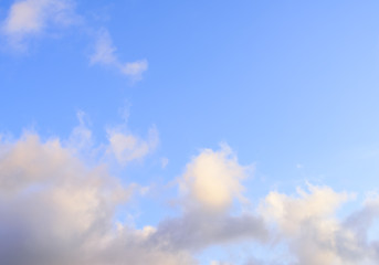 Puffy clouds against blue sky wallpaper background