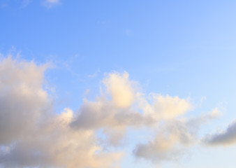 Puffy clouds against blue sky wallpaper background
