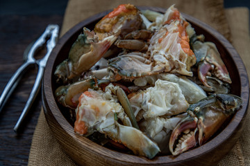 Close-up of Fish sauce-fermented Horse crab and Sea Crab Egg Pickled in Fish Sauce in wooden bowl.