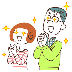 目を輝かせて祈る夫婦
