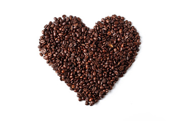 Heart of coffee beans background isolated on white background. Top view. 