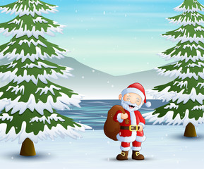 Fototapeta premium Santa claus standing with sack of presents in forest