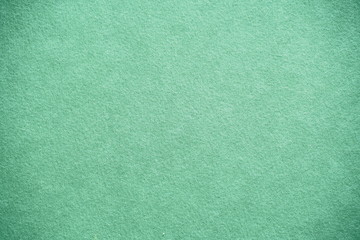 antique colored paper background texture with dark in old distressed vintage design. Colour of paper turquoise , christmas texture