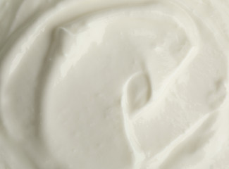 Tasty organic yogurt in bowl, top view