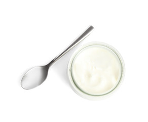 Fototapeta na wymiar Tasty organic yogurt in glass jar and spoon isolated on white, top view