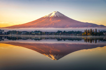 Fototapeta na wymiar Fuji Mountain Reflection with Morning Mist at Sunrise, Kawaguchiko Lake, Japan