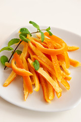 Candied orange peel is a favorite Christmas treat for children and adults. Image of homemade candied orange peel.