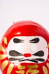 Daruma Doll isolated against white