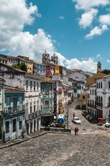 Salvador, Bahia / Brasil - 11/14/2019: Cityscape of old part of Salvador Bahia with colorful houses and beautiful clouds and blue sky
