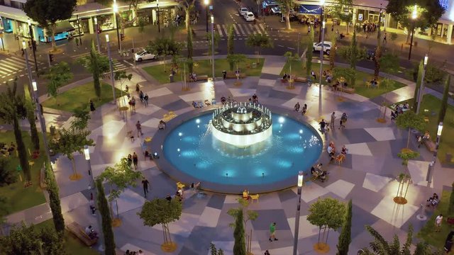 Dizengoff square in tel Aviv, Israel, at night, 4k aerial drone view